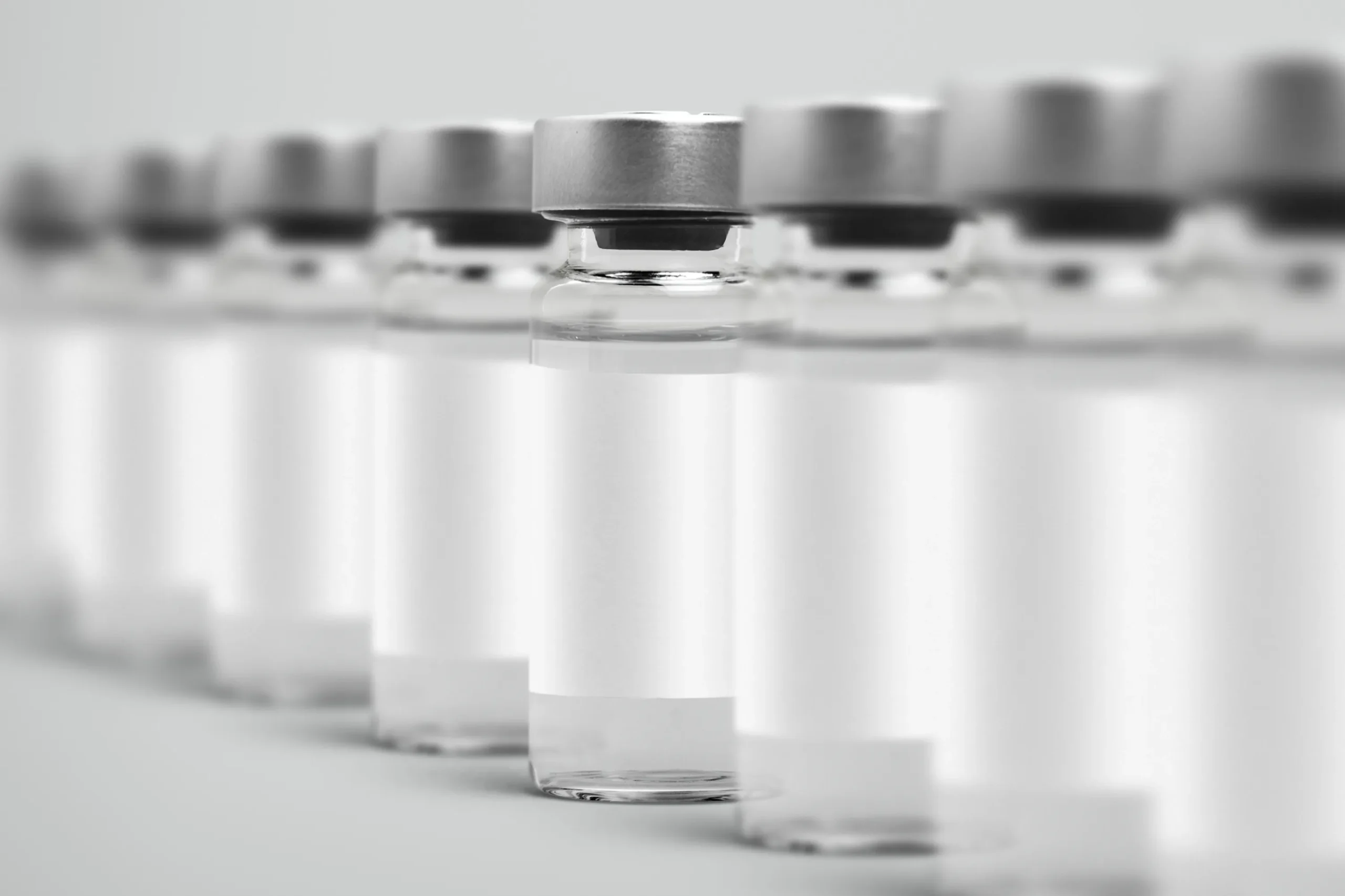 Close-up view of sterile Ready-to-Fill Vials in a production line, prepared for pharmaceutical filling.